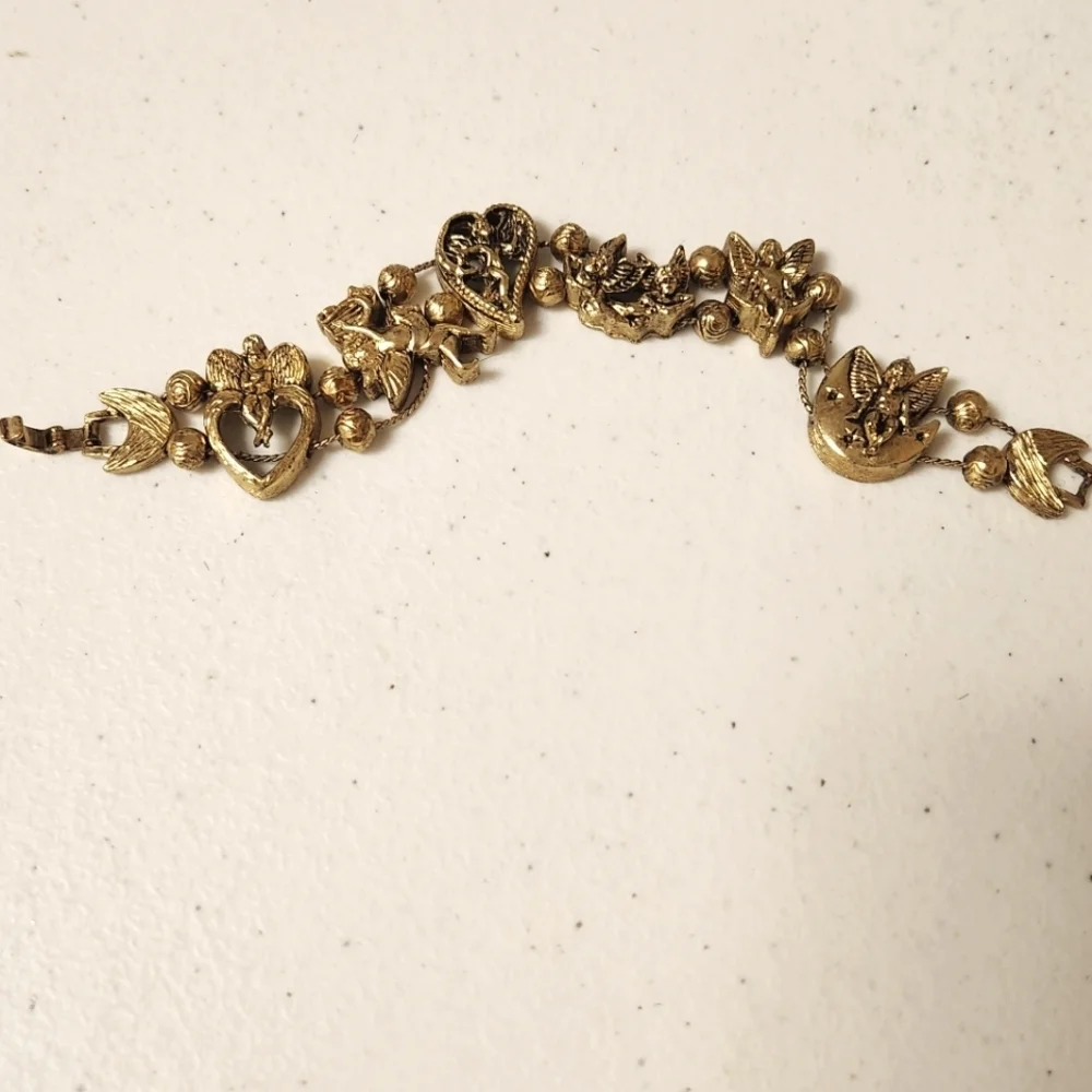 Tofa vintage‎ 90s bronze cast angels slide bracelet
